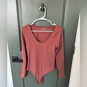 Like new Abercrombie rust colored body suit size M